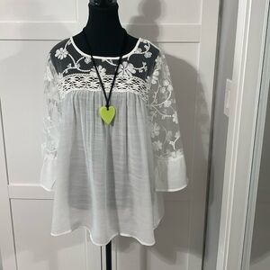 Fun, white sheer top